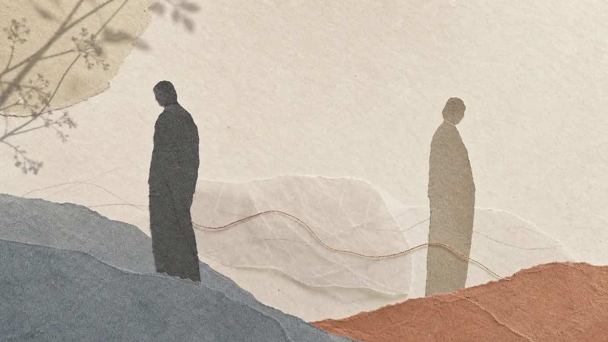 Two paper-collage figures stand far apart on muted hills, a faint thread trailing between them across the gap.
